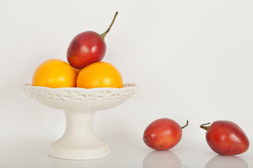 Porcelain fruit bowl with fruits.