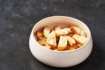 Sweet cookies with nuts on white bowl. Healthy snack