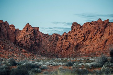 The last sun rays on red mountains in Valley of fire