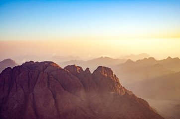 Naklejka premium Mountain landscape at sunrise, view from Mount Moses, Sinai Peninsula, Egypt