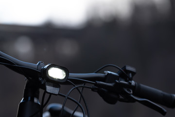 bicycle with front light - Powered by Adobe