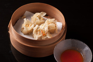 Dim Sum On Bowl with Chopsticks