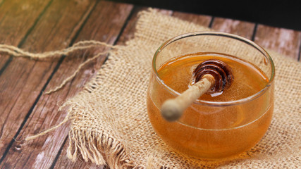 Honey is nutritious for health, stirring with a honey spoon 
