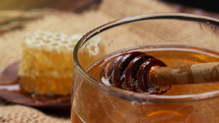Honey is nutritious for health, stirring with a honey spoon 