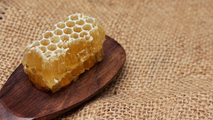 Honey is nutritious for health, stirring with a honey spoon 