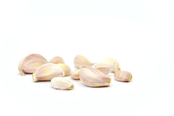 Raw Garlic Segments Isolated on White Background
