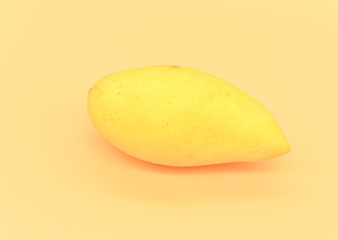 Ripe Mango Isolated on Light Orange Background