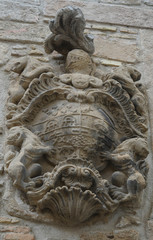 Old shield in an Olite house, in Navarra