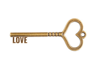 Key giving love. Bronze vintage keys isolated on white