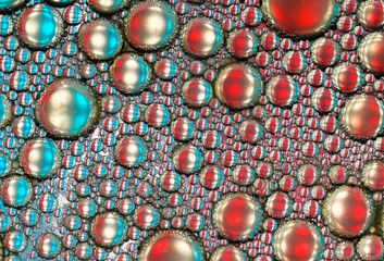 Oil and water abstract macro closeup in red white and blue
