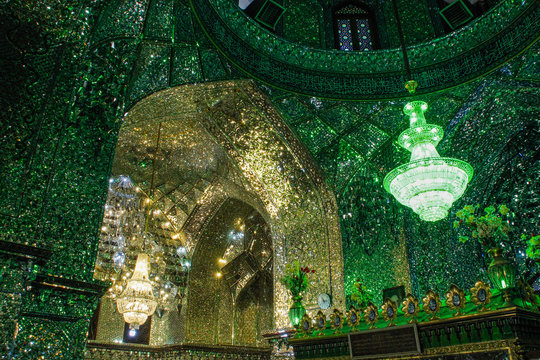 Shiraz, Iran - May 16, 2017: is a funerary monument and mosque in Shiraz, Iran, housing the tomb of the brothers Ahmad and Muhammad. Unusual mosque with many mirrors reflecting green