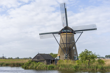 Fototapeta na wymiar Travel in Netherlands . traditional Holland - Windmills