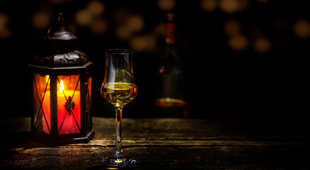 Enjoy a glass of whiskey in the cellar bar with a lantern light
