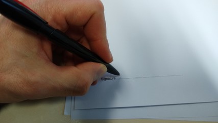 Sign a contract - Agreement paper