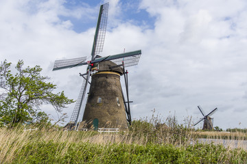 Fototapeta na wymiar Travel in Netherlands . traditional Holland - Windmills