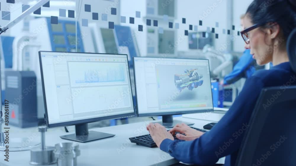 Aufkleber Industrial Female Engineer Working on a Personal Computer, Two Monitor Screens Show CAD Software with 3D Prototype of New Hybrid Hydrogen Engine and Charts. Modern Factory with High-Tech Machinery