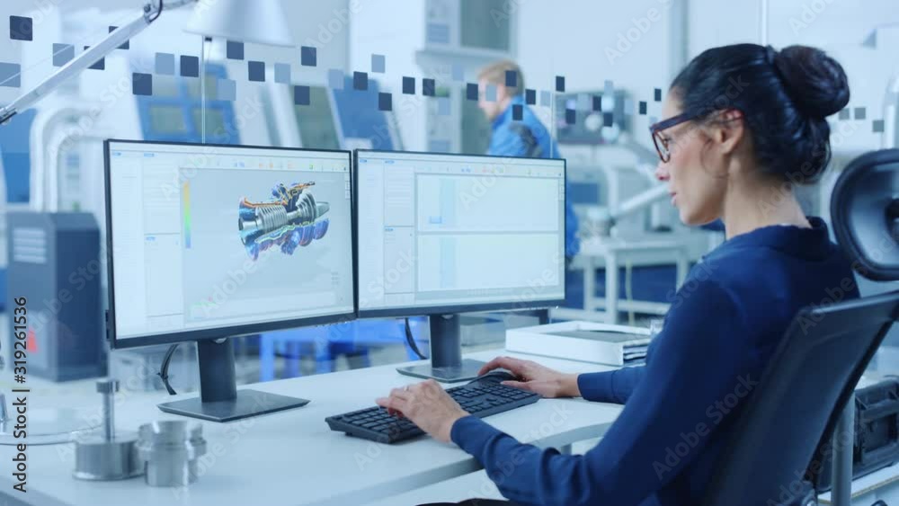 Poster industrial female engineer working on a personal computer, two monitor screens show cad software wit