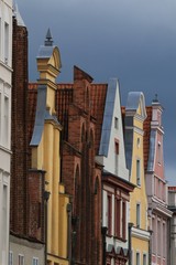 row of houses with historic gable facades in the old town of 