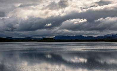 Fototapeta na wymiar Reflections of clouds in Myvatn Lake between Reykjahlid and Skutustadir, Iceland