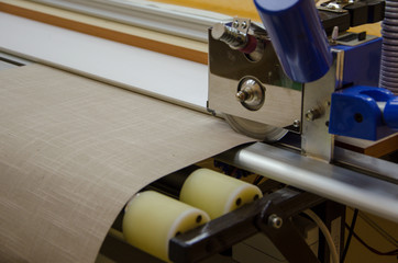 Roll curtain cutting machine