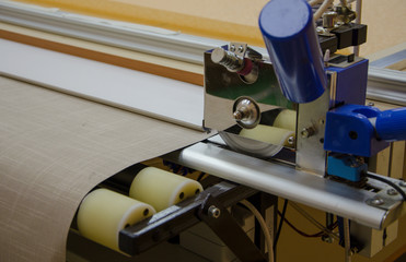 Roll curtain cutting machine