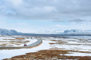 Golden Circle: Car along route 36 near Thingvallavatn lake (region of Suðurland, Iceland)