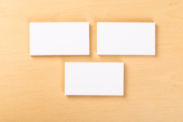 Photo of blank business cards on a general background. Template for identifier. View from above. mock up