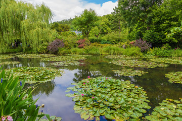 Giverny, France. Picturesque pond with water lilies in the estate of Claude Monet