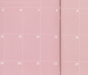 Close up of a pink pocket calendar that is blank