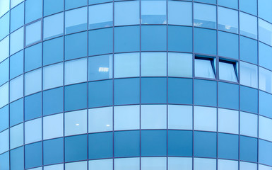 Fototapeta na wymiar futuristic glass building with economic cooperation