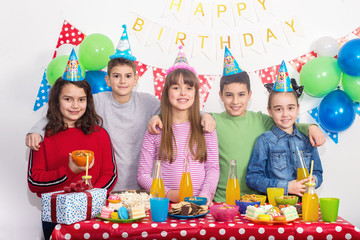 Group of children at birthday party at home