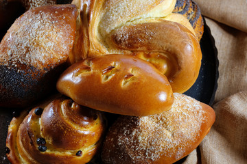 Freshly baked homemade cakes. Sweet buns close up. View from above.