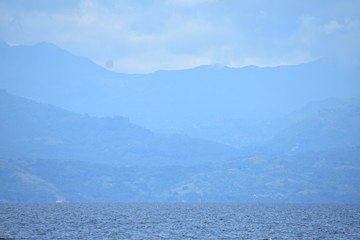 Obraz premium Blue Ocean Water Horizon And Cloudy Sky