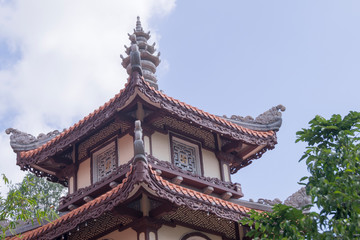  roof of an asian temple against the sky