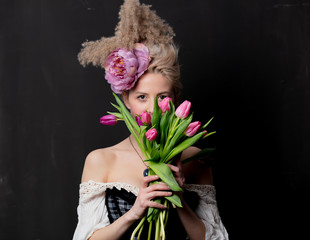 Beautiful blonde countess with tulips