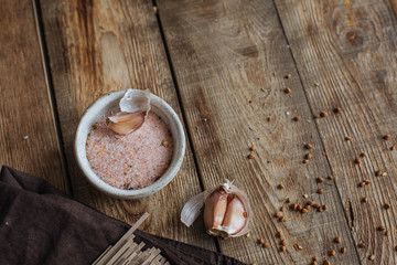 Pink salt on a wooden table