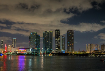 Miami city skyline panorama at dusk with urban skyscrapers.