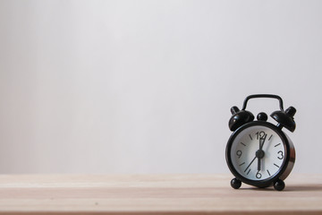 vintage alarm clock on the table