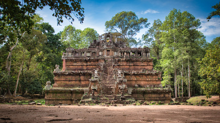 Fototapeta na wymiar Phimeanakas Temple site among the ancient ruins of Angkor Wat