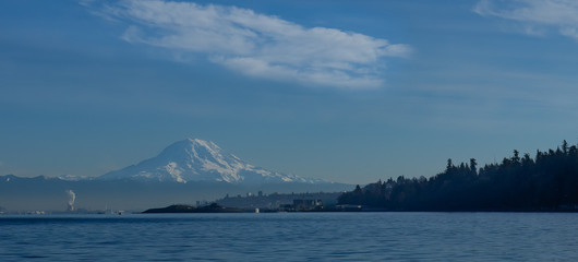 Panorama of Mt. Rainier with Tacoma Washington and Pt Defiance Park in foreground taken from Puget...