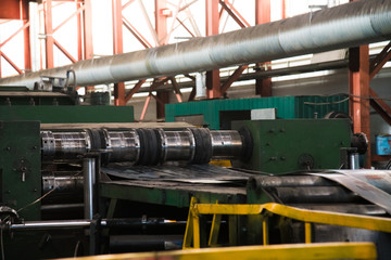 Fototapeta na wymiar Plant for the production of metal pipes. Stack of steel pipes