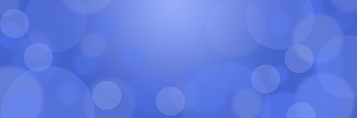 Abstract blue bokeh banner background - birthday, father's day, valentine's day panorama - blurry bokeh circles on a blue background with sunbeams in the center