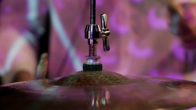 Musician playing drums in close up
