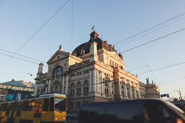 Plakat Opera house and yellow tram.Old streets of Lviv. Austrian architecture. City details. The atmosphere of Leopolis.