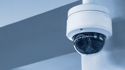 A review of surveillance cameras on white background. Security concept. Facial recognition. Program search for criminals. - obrazy, fototapety, plakaty