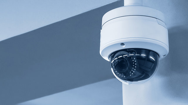 A review of surveillance cameras on white background. Security concept. Facial recognition. Program search for criminals.