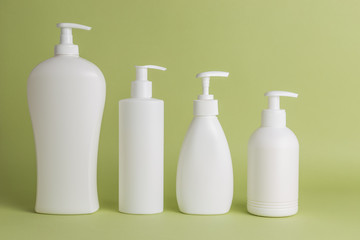 White plastic soap dispensers. Copy space. Place for text.