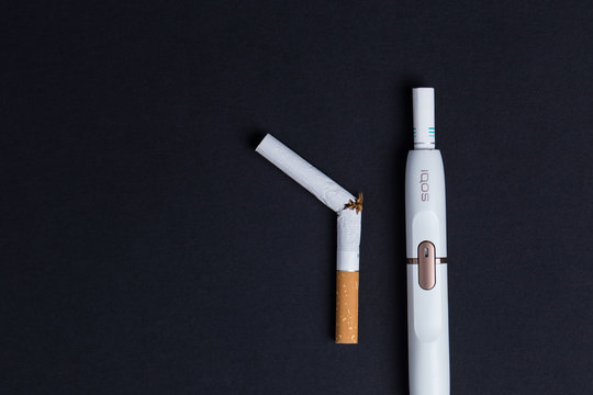 Phillip Morris International's Marlboro IQOS, Electronic Cigarette On A Black Background