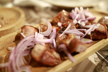 Pork kebab with onions