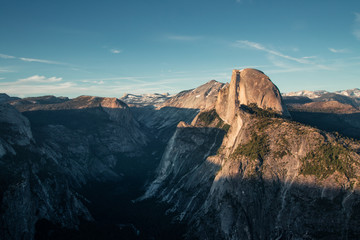 Fototapeta na wymiar Last light of the day in the Yosemite Valley. Beautiful sunset over the Half Dome in one of the most gorgeous national parks of USA in California